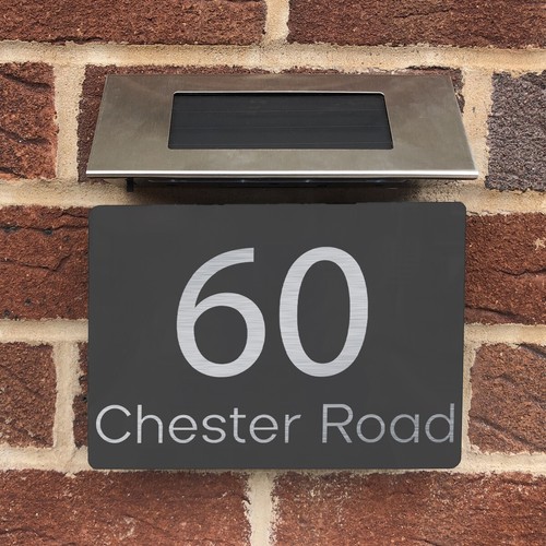 House number plaques with - number,